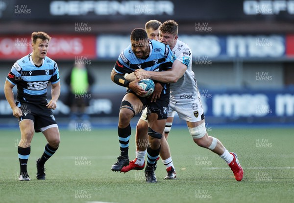 151022 - Cardiff Rugby v Dragons RFC - BKT United Rugby Championship - Taulupe Faletau of Cardiff is tackled by Will Rowlands of Dragons