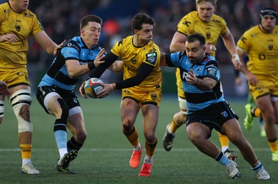 261225 - Cardiff Rugby v Dragons RFC, United Rugby Championship - Che Hope of Dragons RFC takes on Liam Belcher of Cardiff Rugby and Josh Adams of Cardiff Rugby