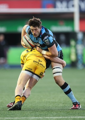 261225 - Cardiff Rugby v Dragons RFC, United Rugby Championship - Rory Thornton of Cardiff Rugby is tackled