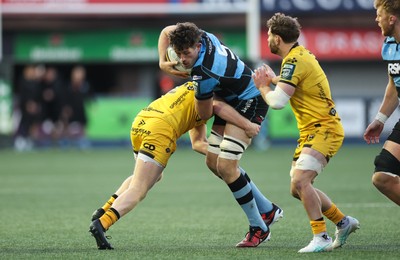 261225 - Cardiff Rugby v Dragons RFC, United Rugby Championship - Rory Thornton of Cardiff Rugby is tackled