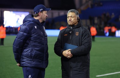261225 - Cardiff Rugby v Dragons RFC, United Rugby Championship - Cardiff Rugby head coach Corniel van Zyl, left with Dragons Head Coach Filo Tiatia