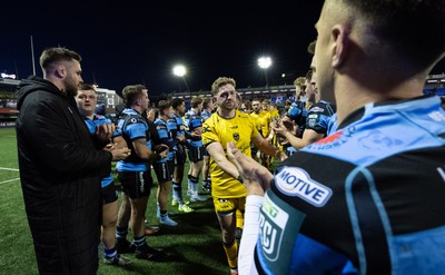 261225 - Cardiff Rugby v Dragons RFC, United Rugby Championship - The teams congratulate each other at the end of the match