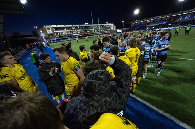 261225 - Cardiff Rugby v Dragons RFC, United Rugby Championship - The teams congratulate each other at the end of the match