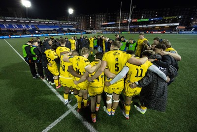 261225 - Cardiff Rugby v Dragons RFC, United Rugby Championship - The Dragons team huddle up at the end of the match 