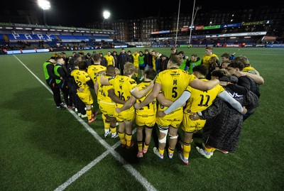 261225 - Cardiff Rugby v Dragons RFC, United Rugby Championship - The Dragons team huddle up at the end of the match 