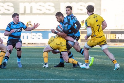 261225 - Cardiff Rugby v Dragons RFC - United Rugby Championship - Taulupe Faletau of Cardiff Rugby is tackled by Tinus de Beer  of Dragons