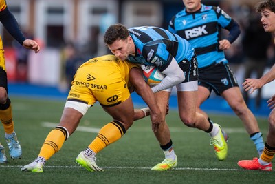 261225 - Cardiff Rugby v Dragons RFC - United Rugby Championship - Mason Grady of Cardiff Rugby is tackled by Fine Inisi of Dragons