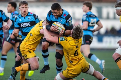 261225 - Cardiff Rugby v Dragons RFC - United Rugby Championship - Taulupe Faletau of Cardiff Rugby is tackled by Ryan Woodman of Dragons