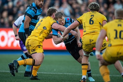 261225 - Cardiff Rugby v Dragons RFC - United Rugby Championship - Aled Davies of Cardiff Rugby is tackled by George Roberts of Dragons