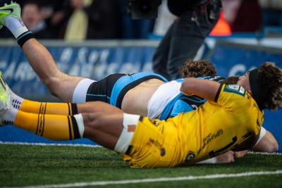 261225 - Cardiff Rugby v Dragons RFC - United Rugby Championship - Fine Inisi of Dragons prevents Mason Grady of Cardiff Rugby from scoring a try
