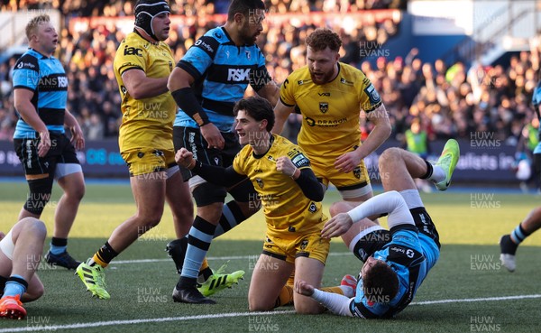 261225 - Cardiff Rugby v Dragons RFC, United Rugby Championship - Che Hope of Dragons RFC celebrates after he powers over for the opening try