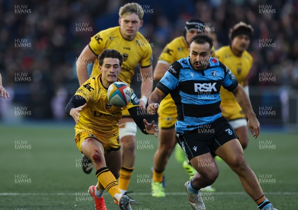 261225 - Cardiff Rugby v Dragons RFC, United Rugby Championship - Che Hope of Dragons RFC and Liam Belcher of Cardiff Rugby compete for the ball