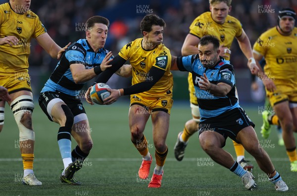 261225 - Cardiff Rugby v Dragons RFC, United Rugby Championship - Che Hope of Dragons RFC takes on Liam Belcher of Cardiff Rugby and Josh Adams of Cardiff Rugby