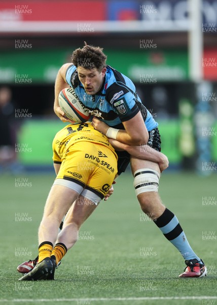 261225 - Cardiff Rugby v Dragons RFC, United Rugby Championship - Rory Thornton of Cardiff Rugby is tackled