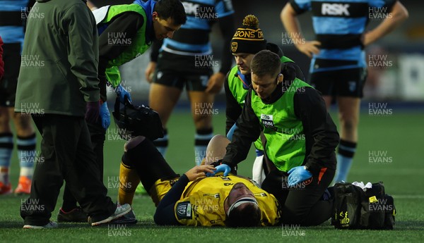 261225 - Cardiff Rugby v Dragons RFC, United Rugby Championship - Robert Hunt of Dragons RFC is treated for an injury before being stretchered from the pitch