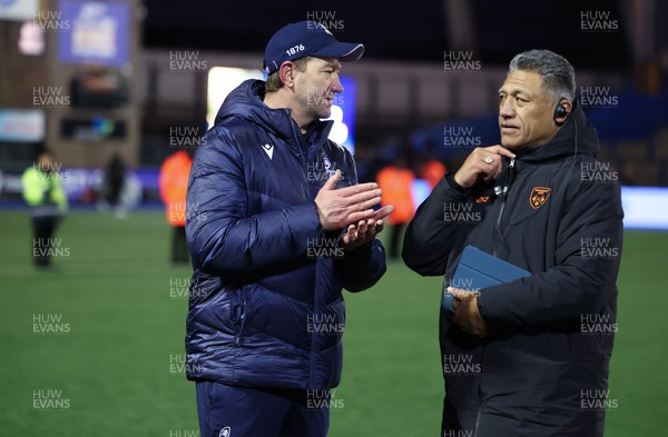 261225 - Cardiff Rugby v Dragons RFC, United Rugby Championship - Cardiff Rugby head coach Corniel van Zyl, left with Dragons Head Coach Filo Tiatia