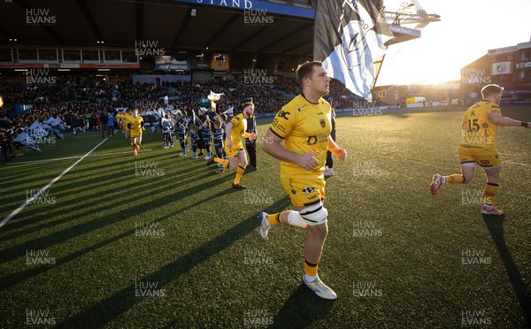 261225 - Cardiff Rugby v Dragons RFC, United Rugby Championship - Dragons players run out at the start of the match