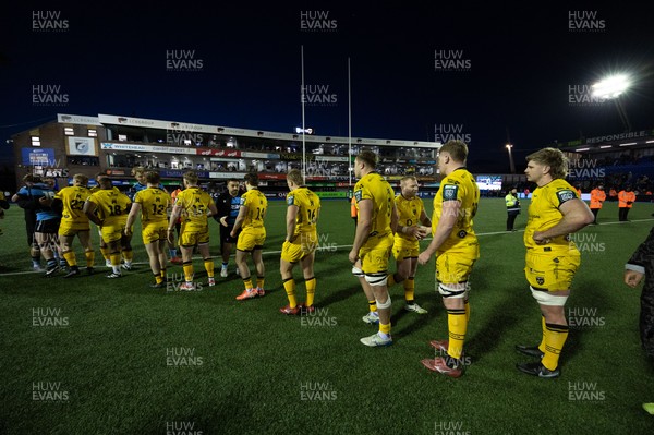 261225 - Cardiff Rugby v Dragons RFC, United Rugby Championship - The teams congratulate each other at the end of the match