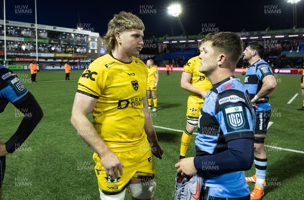 261225 - Cardiff Rugby v Dragons RFC, United Rugby Championship - Aaron Wainwright of Dragons RFC and Callum Sheedy of Cardiff Rugby at the end of the match