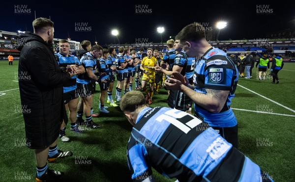261225 - Cardiff Rugby v Dragons RFC, United Rugby Championship - The teams congratulate each other at the end of the match