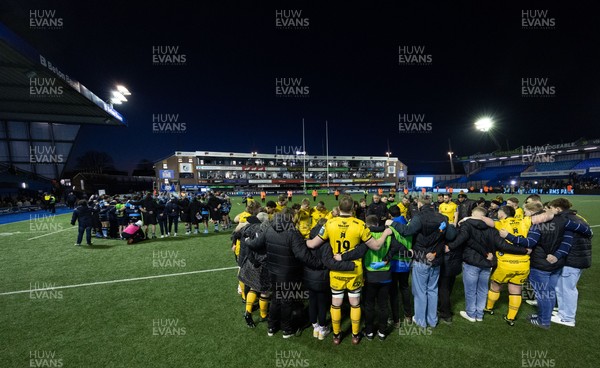 261225 - Cardiff Rugby v Dragons RFC, United Rugby Championship - The Dragons team huddle up at the end of the match 