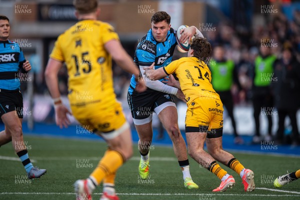 261225 - Cardiff Rugby v Dragons RFC - United Rugby Championship - Mason Grady of Cardiff Rugby is tackled by Huw Anderson of Dragons