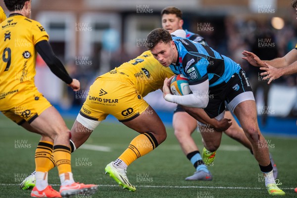 261225 - Cardiff Rugby v Dragons RFC - United Rugby Championship - Mason Grady of Cardiff Rugby is tackled by Fine Inisi of Dragons