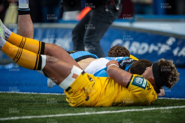 261225 - Cardiff Rugby v Dragons RFC - United Rugby Championship - Fine Inisi of Dragons prevents Mason Grady of Cardiff Rugby from scoring a try