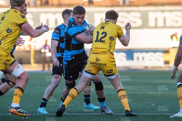 261225 - Cardiff Rugby v Dragons RFC - United Rugby Championship - Alex Mann of Cardiff Rugby is tackled by Aneurin Owen of Dragons