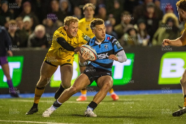 261225 - Cardiff Rugby v Dragons RFC - United Rugby Championship - Cam Winnett of Cardiff Rugby is tackled by David Richards of Dragons