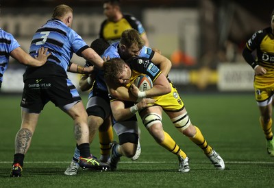 301124 - Cardiff Rugby v Dragons RFC - United Rugby Championship - Matthew Screech of Dragons is tackled by Josh McNally of Cardiff 