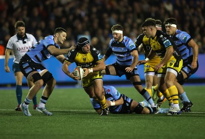 301124 - Cardiff Rugby v Dragons RFC - United Rugby Championship - Rodrigo Martinez of Dragons is tackled by Alun Lawrence of Cardiff 