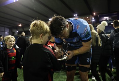 301124 - Cardiff Rugby v Dragons RFC - United Rugby Championship - Teddy Williams of Cardiff with fans after the game