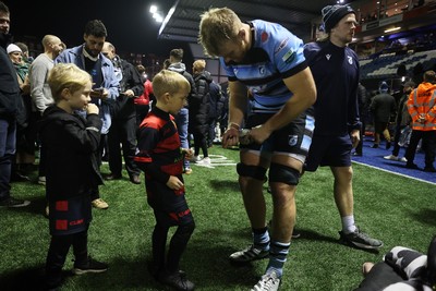 301124 - Cardiff Rugby v Dragons RFC - United Rugby Championship - Josh McNally of Cardiff with fans after the game