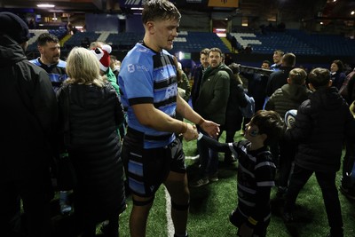 301124 - Cardiff Rugby v Dragons RFC - United Rugby Championship - Alex Mann of Cardiff with fans after the game