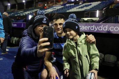 301124 - Cardiff Rugby v Dragons RFC - United Rugby Championship - Ellis Bevan of Cardiff with fans after the game