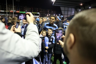 301124 - Cardiff Rugby v Dragons RFC - United Rugby Championship - Ben Thomas of Cardiff with fans after the game