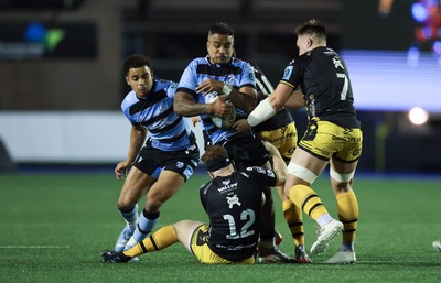 301124 Cardiff Rugby v Dragons RFC, United Rugby Championship - Rey Lee-Lo of Cardiff Rugby takes on Aneurin Owen of Dragons