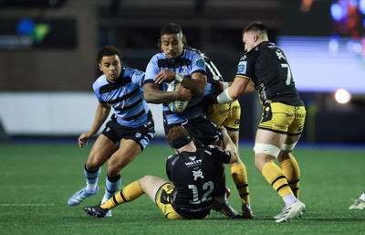 301124 Cardiff Rugby v Dragons RFC, United Rugby Championship - Rey Lee-Lo of Cardiff Rugby takes on Aneurin Owen of Dragons