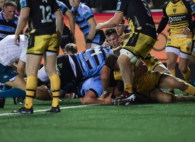 301124 Cardiff Rugby v Dragons RFC, United Rugby Championship -  Alex Mann of Cardiff Rugby borrows over to score try