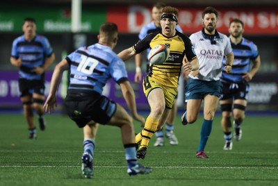 301124 Cardiff Rugby v Dragons RFC, United Rugby Championship - Aneurin Owen of Dragons follows up his kick ahead