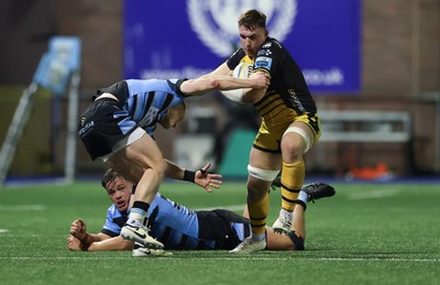 301124 Cardiff Rugby v Dragons RFC, United Rugby Championship - Taine Basham of Dragons holds off Aled Davies of Cardiff Rugby