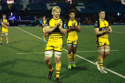 301124 Cardiff Rugby v Dragons RFC, United Rugby Championship - Aaron Wainwright, Rio Dyer and Taine Basham of Dragons applaud the supporters at the end of the match