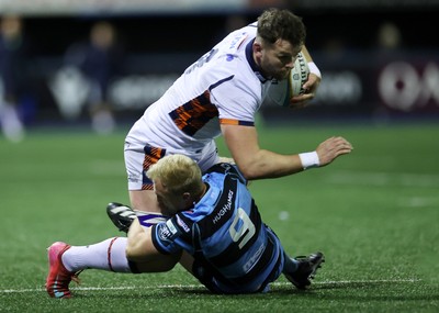 251025 - Cardiff Rugby v Edinburgh - United Rugby Championship - Magnus Bradbury of Edinburgh is tackled by Johan Mulder of Cardiff 