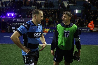 251025 - Cardiff Rugby v Edinburgh - United Rugby Championship - Ioan Lloyd of Cardiff and Leigh Halfpenny at full time