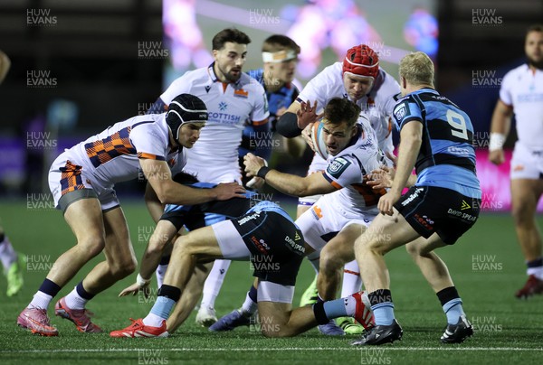 251025 - Cardiff Rugby v Edinburgh - United Rugby Championship - Wes Goosen of Edinburgh is challenged by  Johan Mulder of Cardiff 