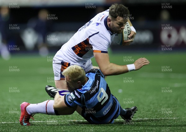 251025 - Cardiff Rugby v Edinburgh - United Rugby Championship - Magnus Bradbury of Edinburgh is tackled by Johan Mulder of Cardiff 