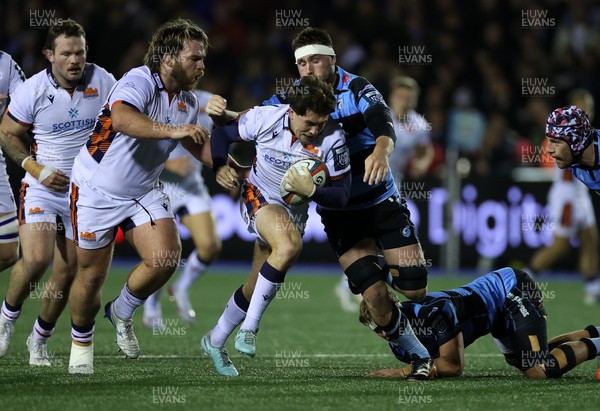 251025 - Cardiff Rugby v Edinburgh - United Rugby Championship - Cammy Scott of Edinburgh is tackled by George Nott of Cardiff 
