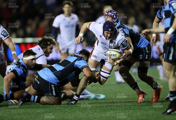 251025 - Cardiff Rugby v Edinburgh - United Rugby Championship - Liam McConnell of Edinburgh is tackled by Liam Belcher and Alun Lawrence of Cardiff 
