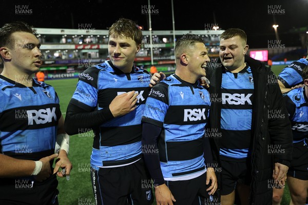 251025 - Cardiff Rugby v Edinburgh - United Rugby Championship - Taine Basham, Jacob Beetham, Callum Sheedy and Danny Southworth of Cardiff at full time